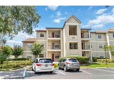 Two-story condo building with ample parking at 3032 Parkway Blvd # 201, Kissimmee, FL 34747
