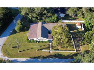 House with a large backyard and shed at 1501 Ne 57Th St, Ocala, FL 34479