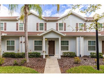 Two story townhome with front entrance at 8968 Silver Pl, Kissimmee, FL 34747