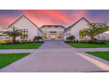 Stunning two-story home with a modern farmhouse design at 9752 Laurel Berry Dr, Orlando, FL 32827