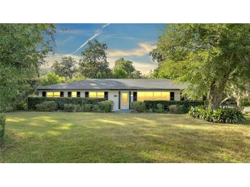 Ranch home with a large yard at 715 Eastover Cir, Deland, FL 32724