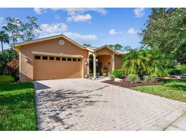 Attractive home exterior with a paved driveway at 350 Balboa Dr, Kissimmee, FL 34759