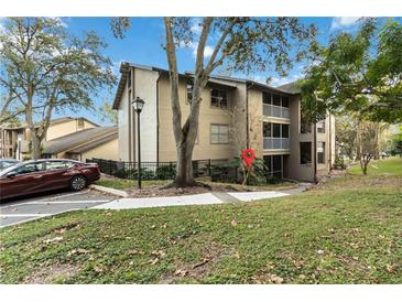 Two-story building with balconies and landscaping at 976 Leeward Pl # 102, Altamonte Springs, FL 32714