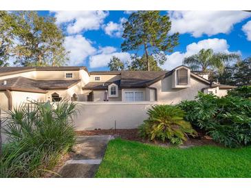 Townhouse with landscaped backyard at 1423 Farrindon Cir # 1423, Lake Mary, FL 32746