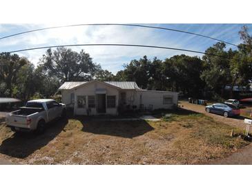 Modest single-story home with a spacious yard and parking at 721 Langston Ave, Haines City, FL 33844