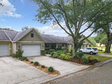 Villa with 2-car garage and landscaped yard at 9460 Sw 84Th Ter # F, Ocala, FL 34481