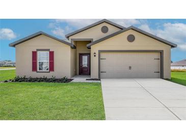 Photo one of 307 Bowfin Ct Poinciana FL 34759 | MLS T3501791