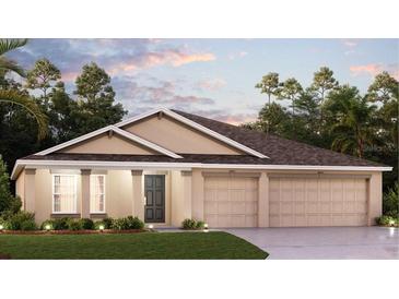Two-story house with three-car garage and landscaping at 3990 Willowbrook Dr, Edgewater, FL 32141