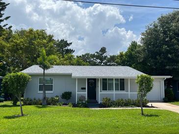 Charming house with gray siding and white trim at 1546 Daytona Ave, Daytona Beach, FL 32117