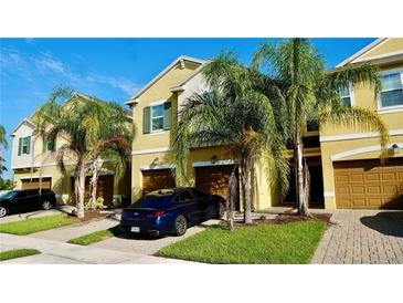 Curb appeal abounds in this charming townhome community, featuring meticulously landscaped grounds at 9980 Red Eagle Dr, Orlando, FL 32825