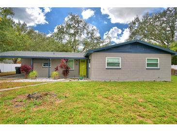 Updated single story home with new landscaping and driveway at 554 Ralph St, Auburndale, FL 33823