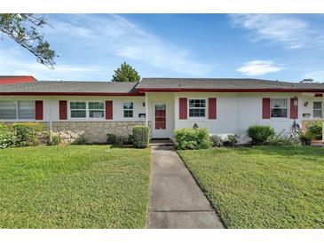 Cozy ranch-style home with red shutters and stone accents at 217 N Hill Ave # 20, Deland, FL 32724