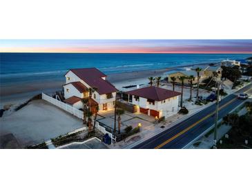 Beachfront property with two houses and ocean views at 4111 S Atlantic Ave, Port Orange, FL 32127