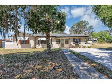 Photo one of 603 S Palm Ave Howey In The Hills FL 34737 | MLS V4936066