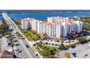 Luxury condo building with waterfront and city views at 1 John Anderson Dr # 1070, Ormond Beach, FL 32176