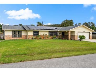 Photo one of 2723 Pine Tree Dr Edgewater FL 32141 | MLS V4939247