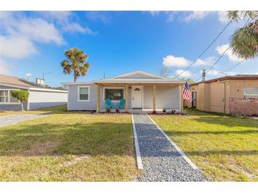 Newly renovated home with a charming front porch and walkway at 1631 Granada Ave, Daytona Beach, FL 32117