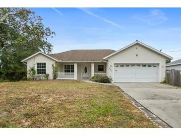 Single-story home with attached garage and well-maintained lawn at 274 Sunrise Blvd, Debary, FL 32713