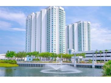 Luxury high rise building with water view and fountain at 231 Riverside Dr # 701, Holly Hill, FL 32117