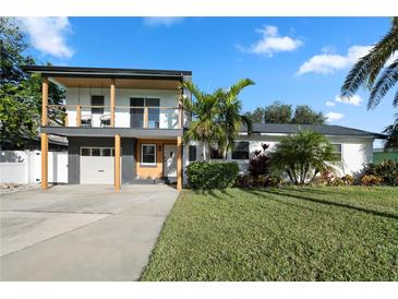 Two-story home with modern updates, a spacious yard, and a detached garage at 3603 Surfside Ter, Port Orange, FL 32127