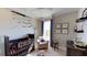 Charming Bedroom with a crib and aviation theme decor at 1341 Arklow Cir, Ormond Beach, FL 32174