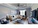 Spacious Gathering room featuring a comfortable sectional sofa and large TV at 1341 Arklow Cir, Ormond Beach, FL 32174