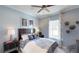 Cozy bedroom featuring a comfortable bed and large window at 1341 Arklow Cir, Ormond Beach, FL 32174