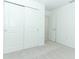 Spacious bedroom with double door closet and carpet at 178 Jones Fish Camp Rd, Edgewater, FL 32141