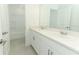 Bright bathroom with double vanity and separate tub at 178 Jones Fish Camp Rd, Edgewater, FL 32141