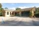 Detached two car garage with ample parking space in front at 33953 Terragona Dr, Sorrento, FL 32776