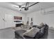 Spacious garage converted into a relaxing lounge area at 2201 Lelani Cir, Davenport, FL 33897