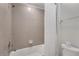 Bathroom with shower/tub combo and white shower curtain at 2201 Lelani Cir, Davenport, FL 33897