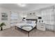 Main bedroom with a king-size bed and ample storage at 2201 Lelani Cir, Davenport, FL 33897