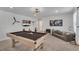 Game room with pool table, comfortable seating, and a TV at 2201 Lelani Cir, Davenport, FL 33897