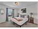 Spacious bedroom with a king-size bed and window at 2201 Lelani Cir, Davenport, FL 33897
