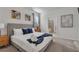 King sized bed, en-suite bathroom, and plenty of natural light at 2201 Lelani Cir, Davenport, FL 33897