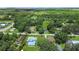 Aerial view of homes and green landscape at 15 N Bloxham Ave, Fort Meade, FL 33841