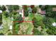 Aerial view of two lots of land at 15 N Bloxham Ave, Fort Meade, FL 33841