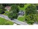 House with a large backyard and surrounding trees at 15 N Bloxham Ave, Fort Meade, FL 33841