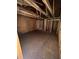 Unfinished bedroom with exposed framing and flooring at 1134 N Davis Ave, Lakeland, FL 33805