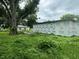 House under construction with Tyvek HomeWrap and large yard at 1134 N Davis Ave, Lakeland, FL 33805