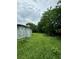 House under construction with Tyvek HomeWrap and large yard at 1134 N Davis Ave, Lakeland, FL 33805