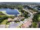 Luxury homes and a lake, showcasing a desirable community at 779 Stephens Pass Cv, Lake Mary, FL 32746