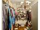 Walk-in closet with shelving and hanging rods at 850 Eden Dr, Saint Cloud, FL 34771