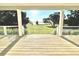 Porch with a view of a lake and grassy landscape at 9123 Silver Lake Dr, Leesburg, FL 34788