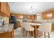 Kitchen with granite countertops, stainless steel appliances, and an island at 11407 Bentry St, Orlando, FL 32824