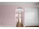 Light and airy hallway with wood floors and archways at 11407 Bentry St, Orlando, FL 32824