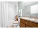 Clean bathroom with tub, shower, and granite countertop at 11407 Bentry St, Orlando, FL 32824