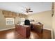 Bright home office with wood desk and hardwood floors at 11407 Bentry St, Orlando, FL 32824