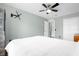 Spacious bedroom with a king-size bed and hardwood floors at 11407 Bentry St, Orlando, FL 32824
